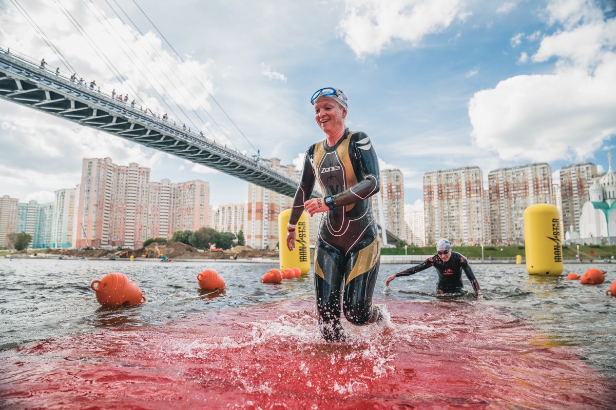 Coach Victoria mid-race, open water